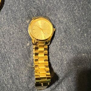 Gold women’s Michael Kors Watch